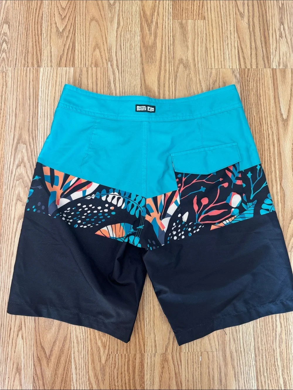 Youth Teal and Black Swim Trunks with Tropical Print